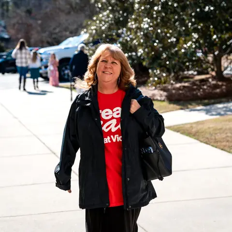 A Dream Team member arriving to serve on a Sunday before a service